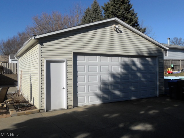 Two car garage with plenty additional storage.