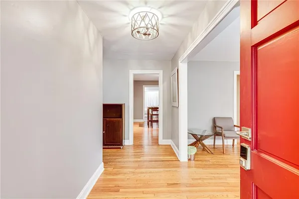 a view of dining room with furniture and wooden floor