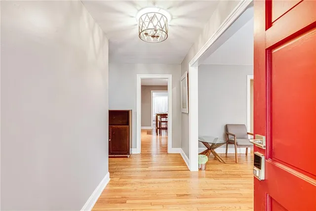 a view of dining room with furniture and wooden floor