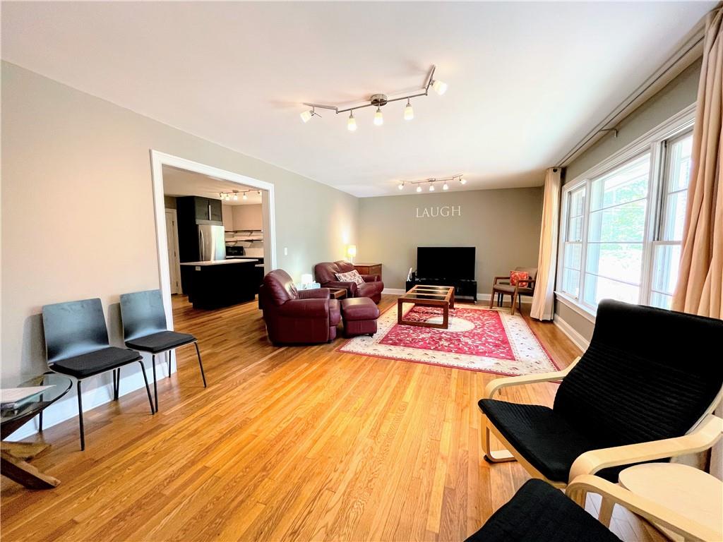1973 Desmond Drive Decatur, GA 30033 - Photo 29 of 38 a living room with furniture and a flat screen tv