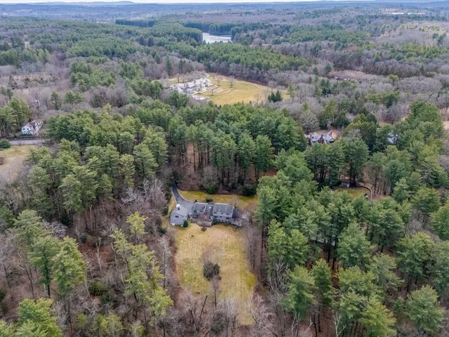 an aerial view of residential house with outdoor space