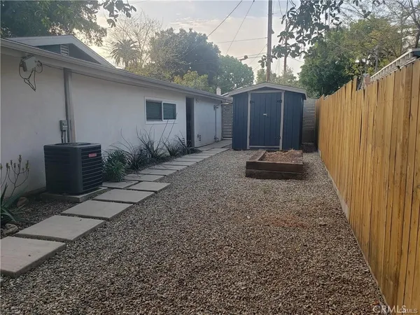 a backyard of a house with seating space
