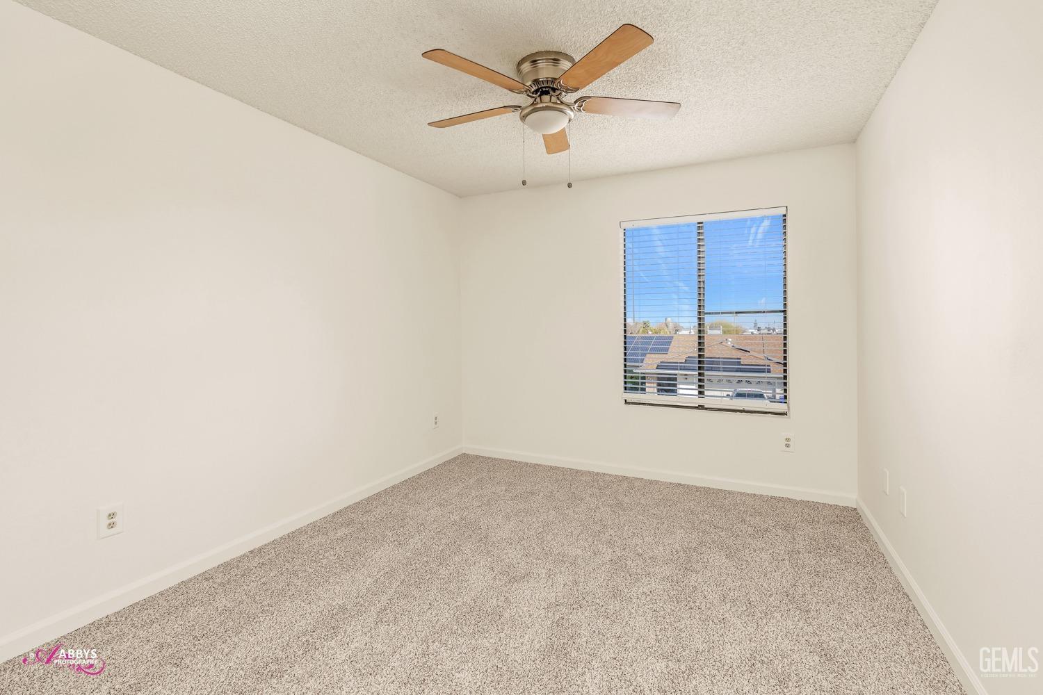 Undisclosed Address Taft, CA 93268 - Photo 29 of 46 3 of 4 bedrooms with new carpet, blinds & fan