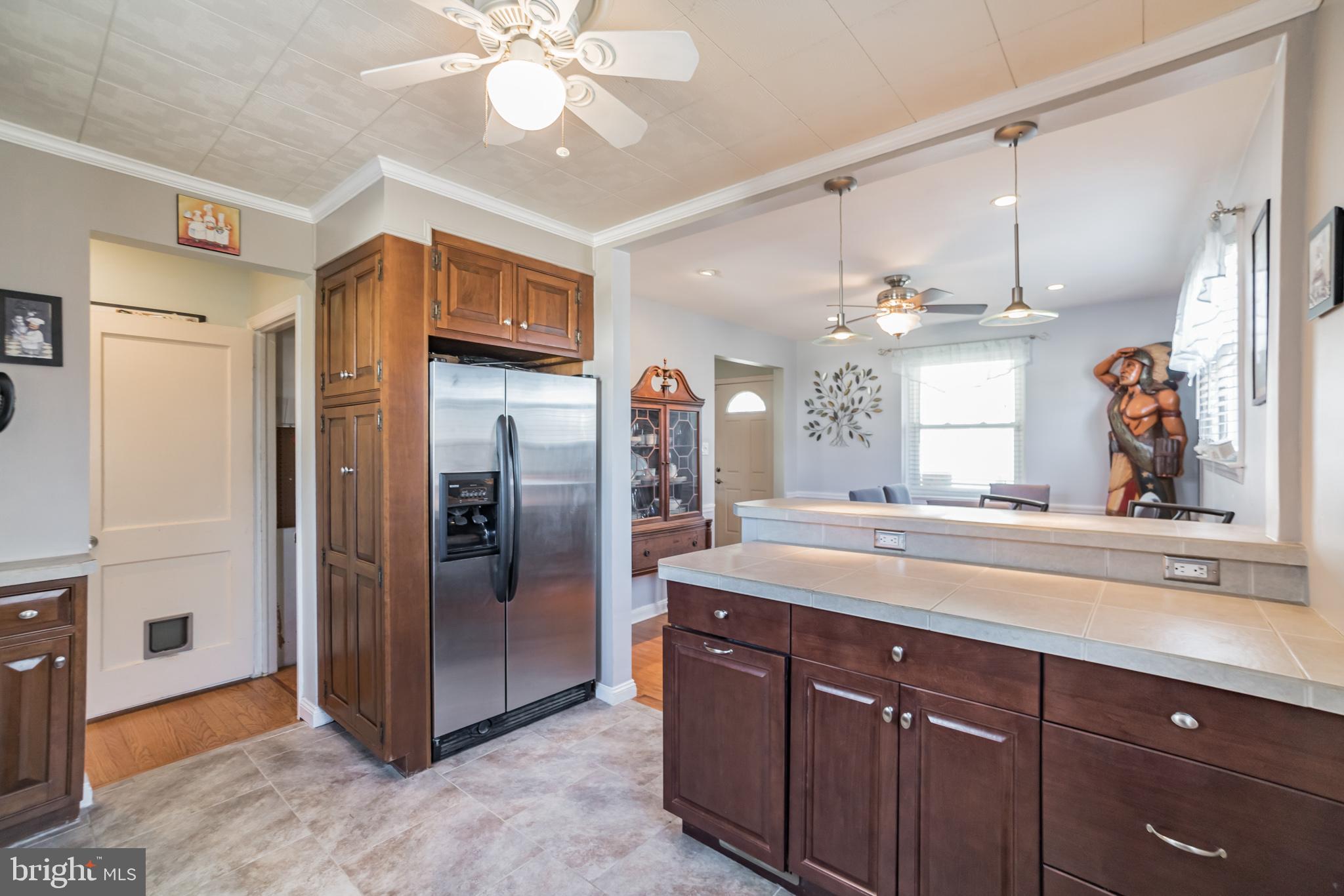 1502 Dorchester Road Havertown, PA 19083 - Photo 12 of 28 Kitchen with custom cabinetry around fridge