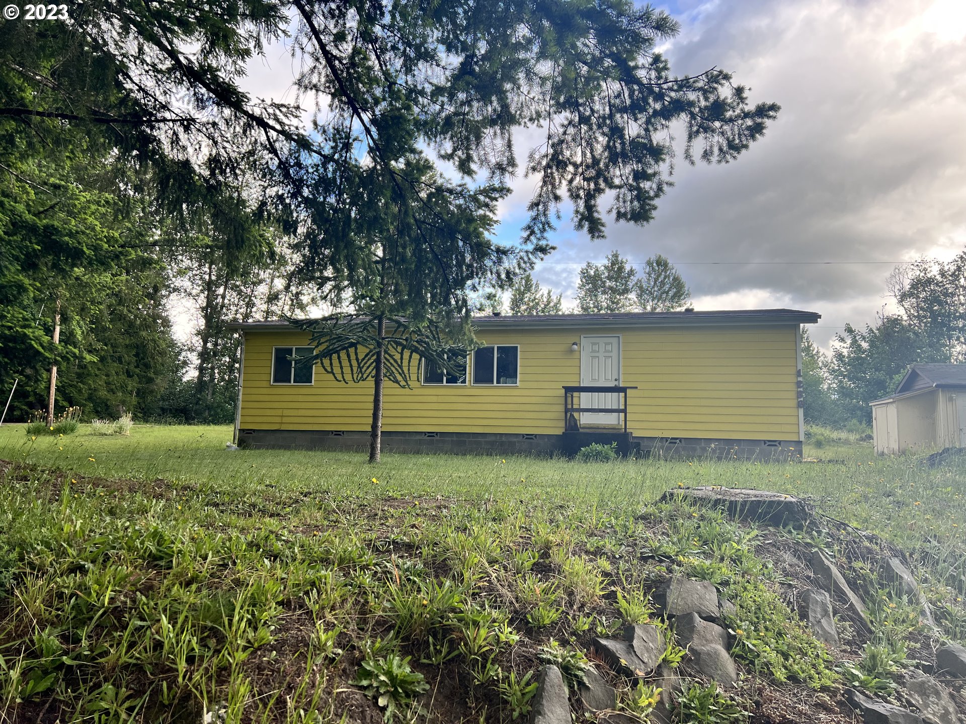 1236 South Toutle Road Toutle, WA 98649 - Photo 1 of 39 a view of a house with a yard