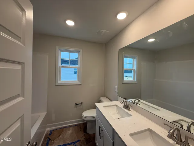 a bathroom with a sink and a toilet