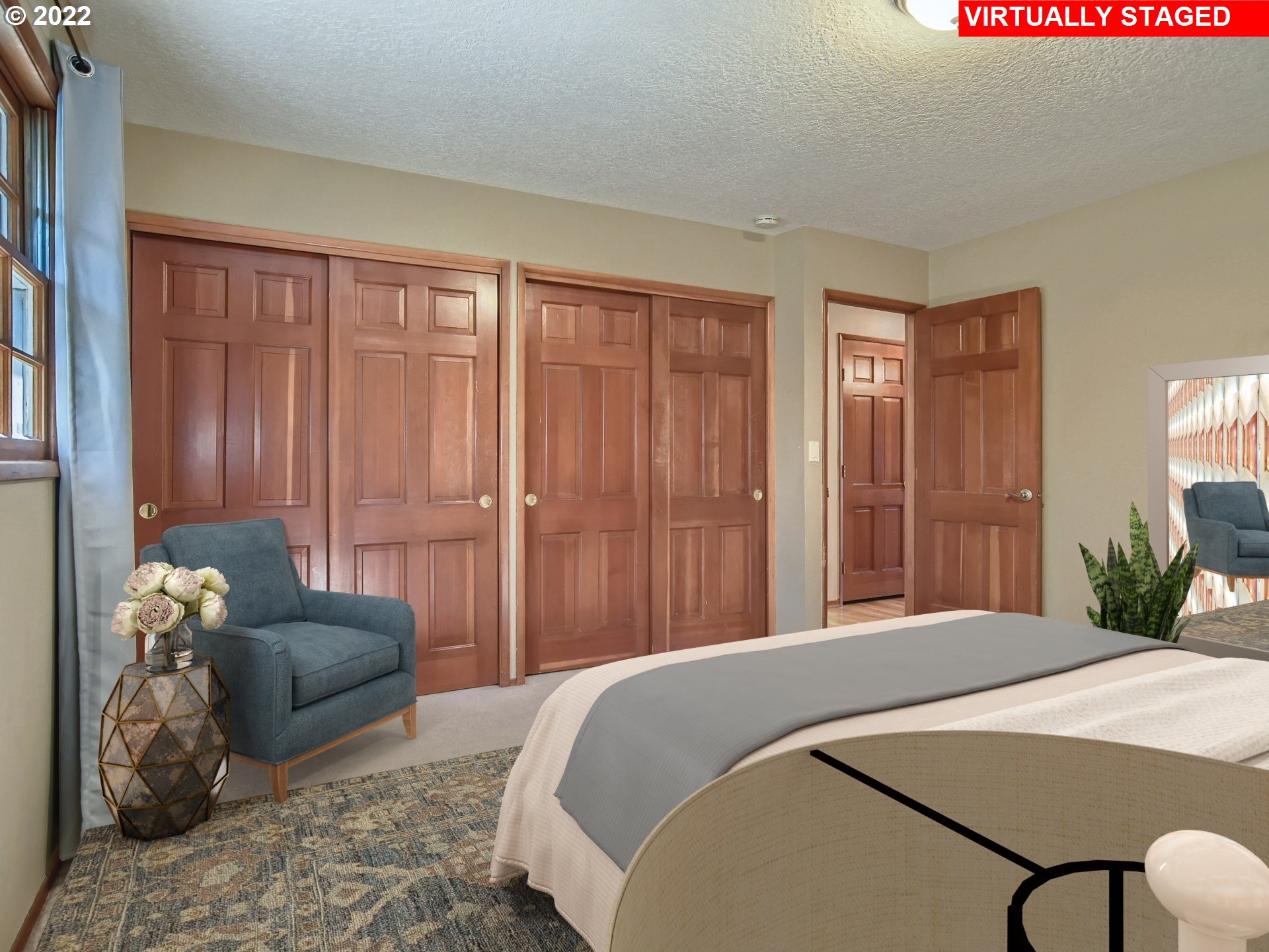10920 Southeast Clay Street Portland, OR 97216 - Photo 14 of 30 a bedroom with a bed and a couch