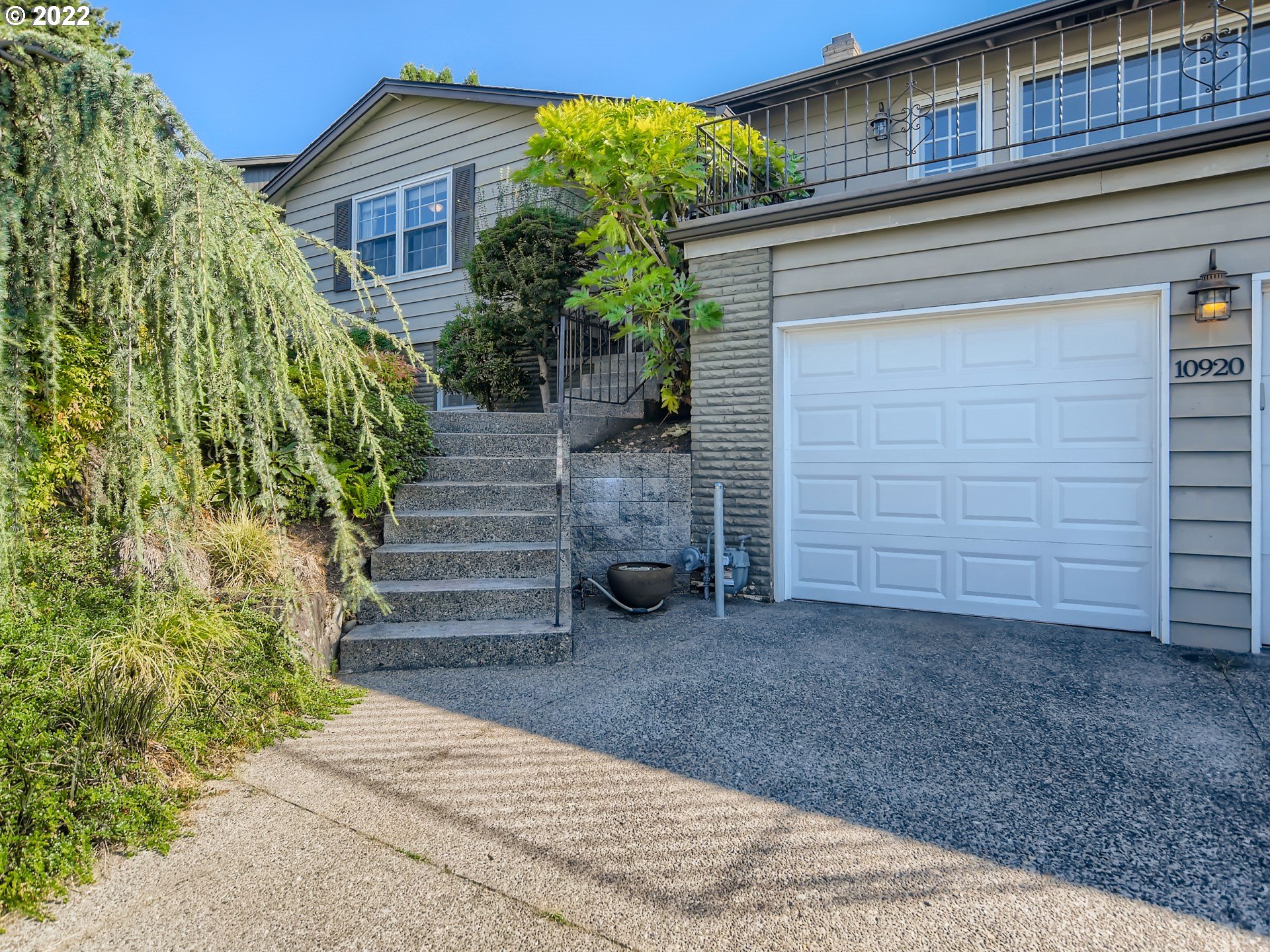 10920 Southeast Clay Street Portland, OR 97216 - Photo 2 of 30 a view of a house with a yard