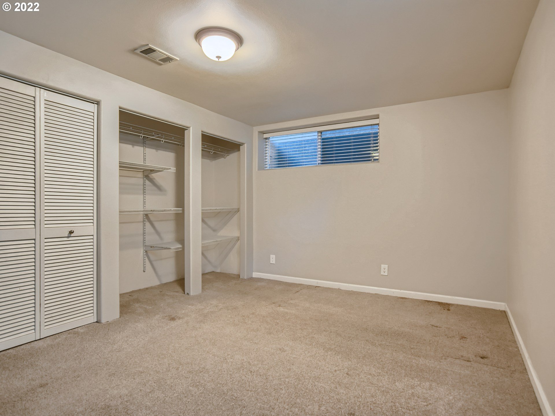 10920 Southeast Clay Street Portland, OR 97216 - Photo 21 of 30 an empty room with closet