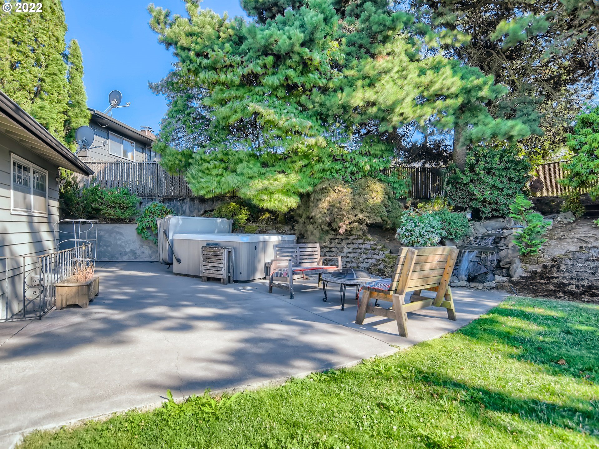 10920 Southeast Clay Street Portland, OR 97216 - Photo 25 of 30 a backyard of a house with table and chairs