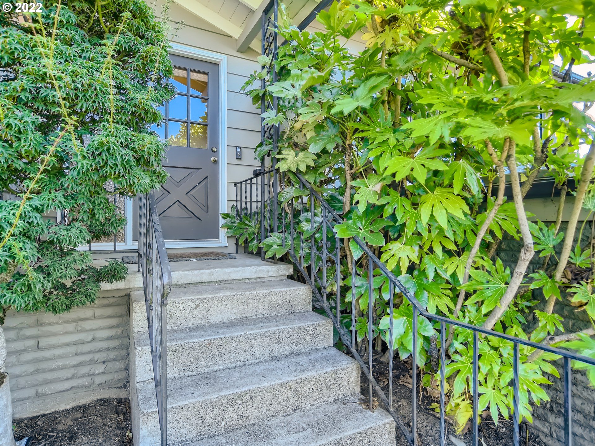 10920 Southeast Clay Street Portland, OR 97216 - Photo 3 of 30 a view of a pathway of plants