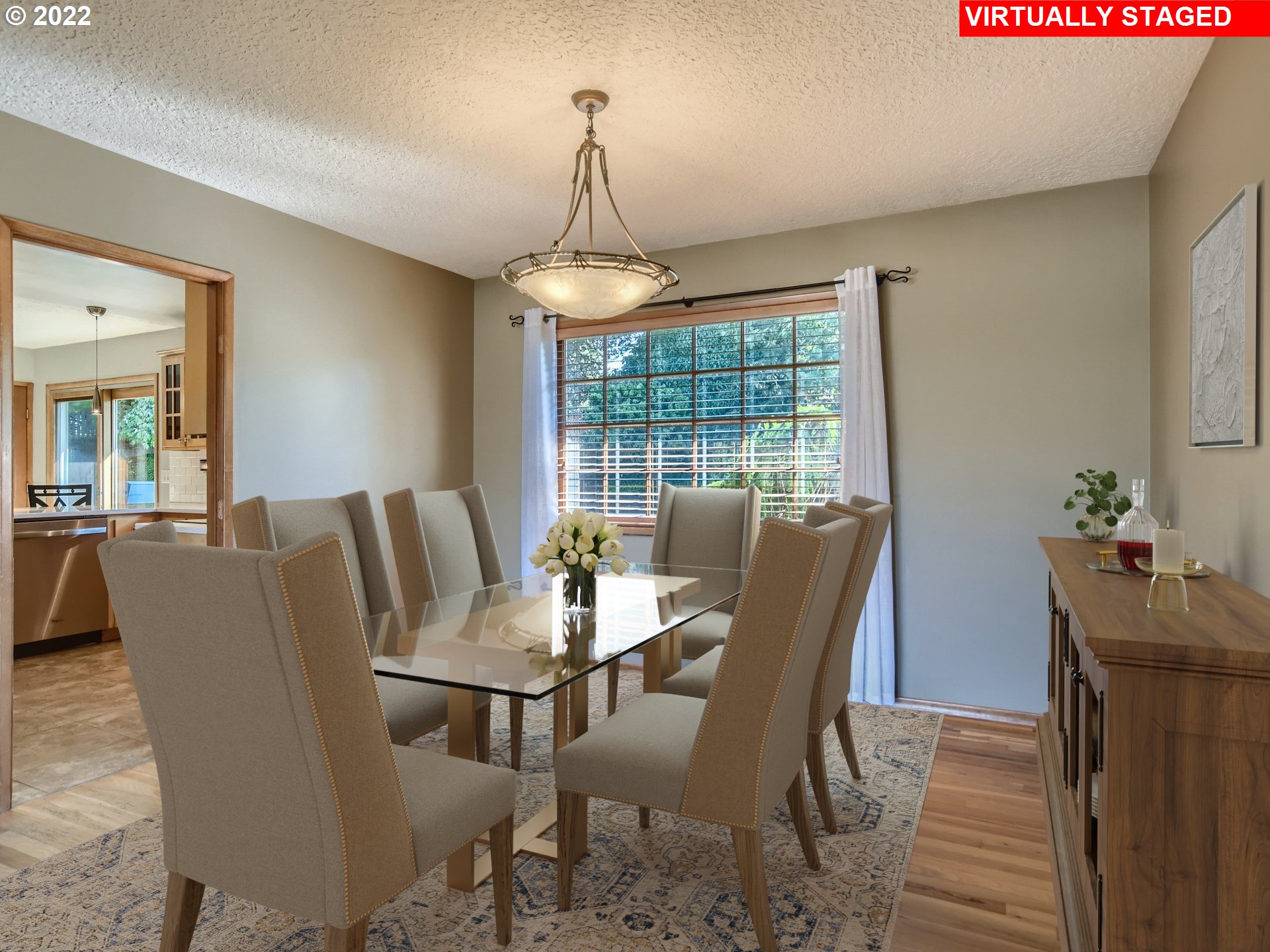 10920 Southeast Clay Street Portland, OR 97216 - Photo 8 of 30 a dining room with furniture a chandelier and wooden floor