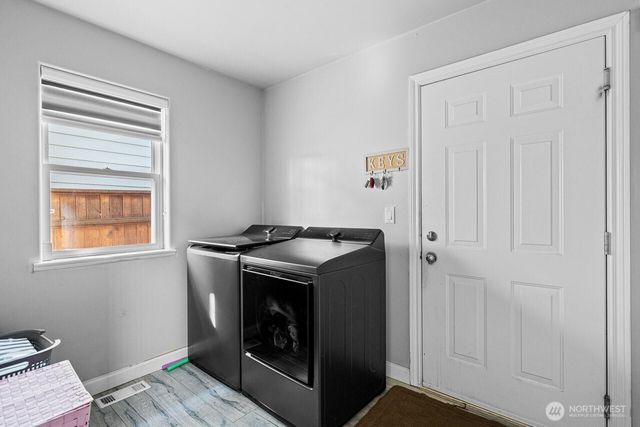 a view of kitchen and utility room