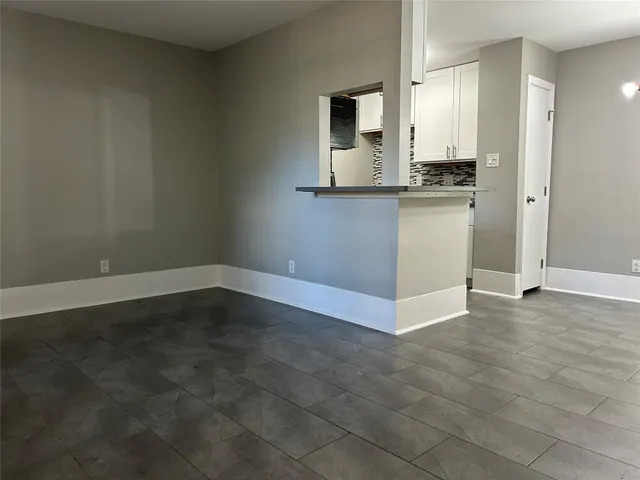 a view of a kitchen with a sink and dishwasher