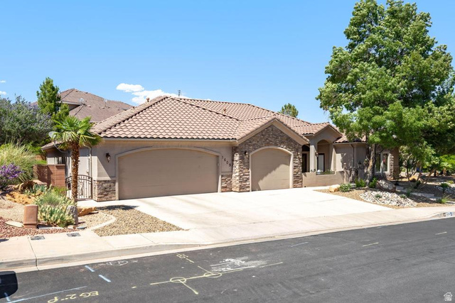 1609 East 10 S Street St. George, UT 84790 - Photo 2 of 68 Mediterranean-style residence featuring a tile roof and stone accents