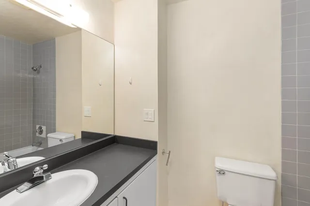 a front view of a house with parking area