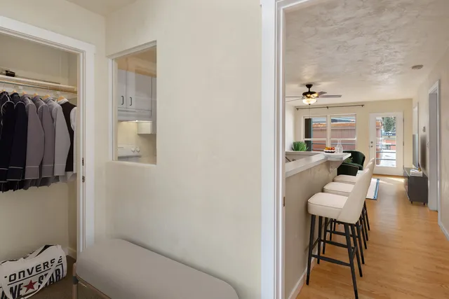 a kitchen with a sink a stove and cabinets