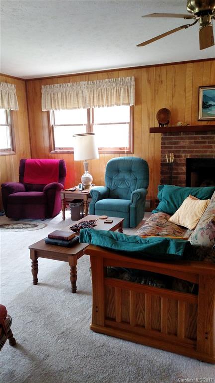 444 Stoney Ridge Loop, Unit 50 Maggie Valley, NC 28751 - Photo 7 of 19 a room with furniture pool table and chairs