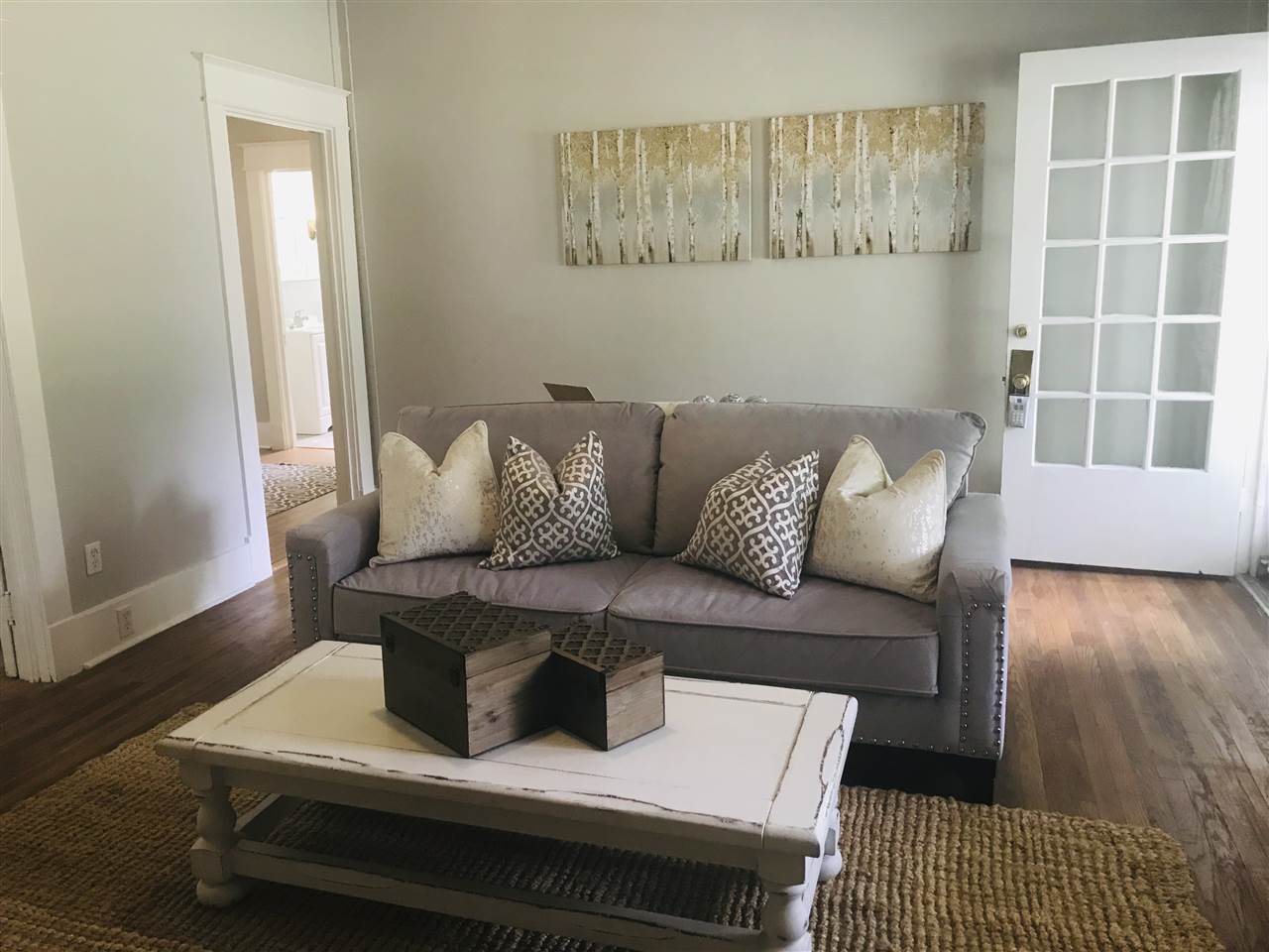 326 North Maple Street Covington, TN 38019 - Photo 2 of 12 With original hardwood floors throughout 2/3rds of the home it always feels warm and inviting for friends & family