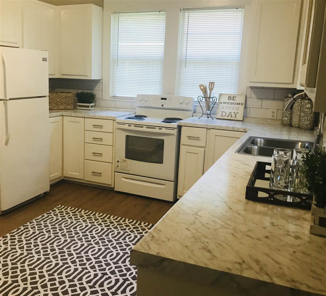 326 North Maple Street Covington, TN 38019 - Photo 6 of 12 Who doesn’t enjoy a large kitchen to get creative in? Whether you’re making cookies or a special dinner for your loved ones~THIS IS IT