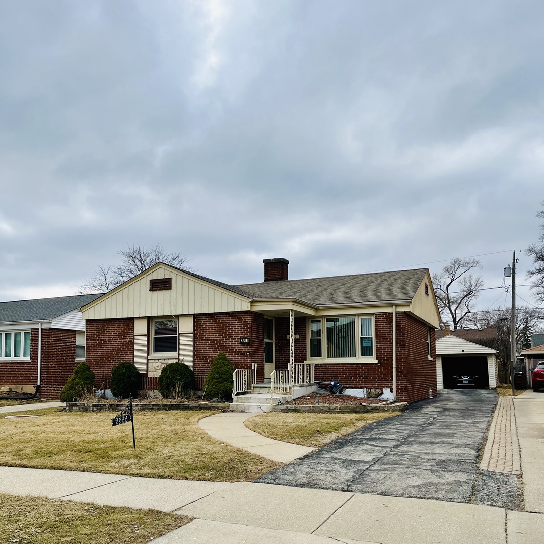 2522 South 3rd Avenue North Riverside, IL 60546 - Photo 3 of 34 a front view of a house with garden