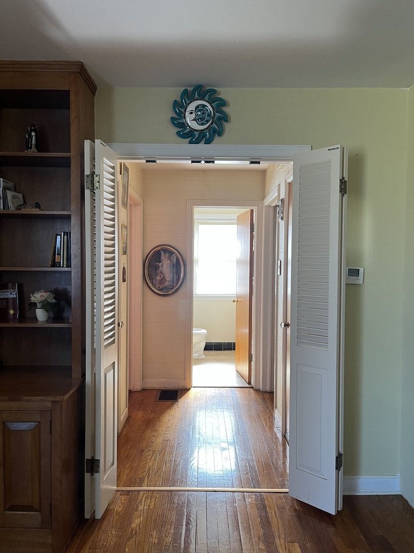 2522 South 3rd Avenue North Riverside, IL 60546 - Photo 8 of 34 a view of a hallway with wooden floor and closet