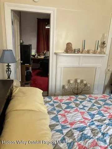 a bedroom with a bed and closet