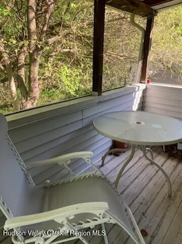 a view of swimming pool from a balcony