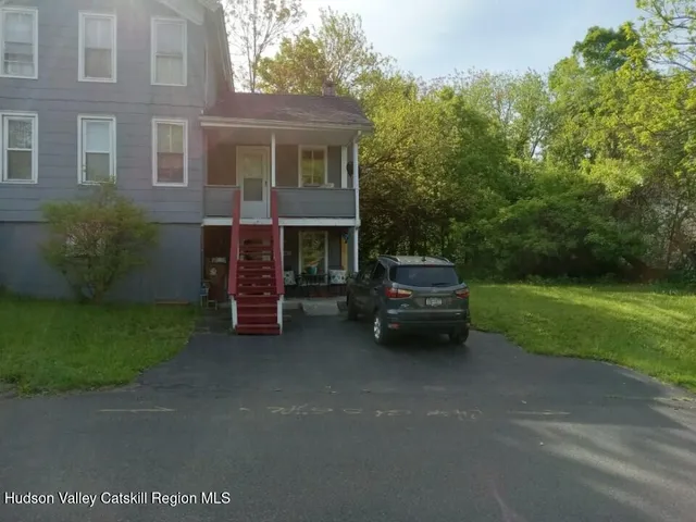 a car parked in front of a house
