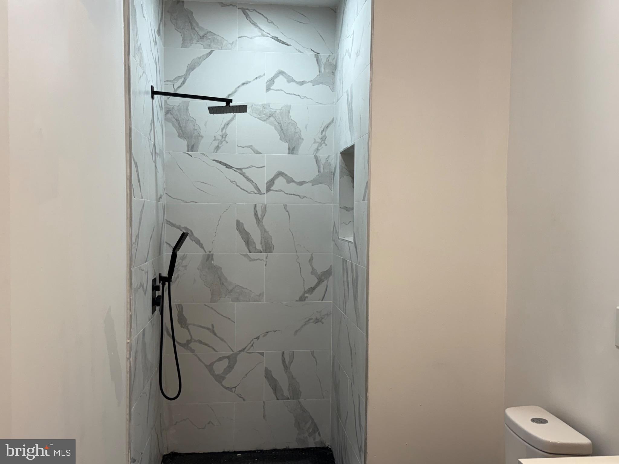 114 South 58th Street, Unit 1 Philadelphia, PA 19139 - Photo 11 of 15 a bathroom with a shower