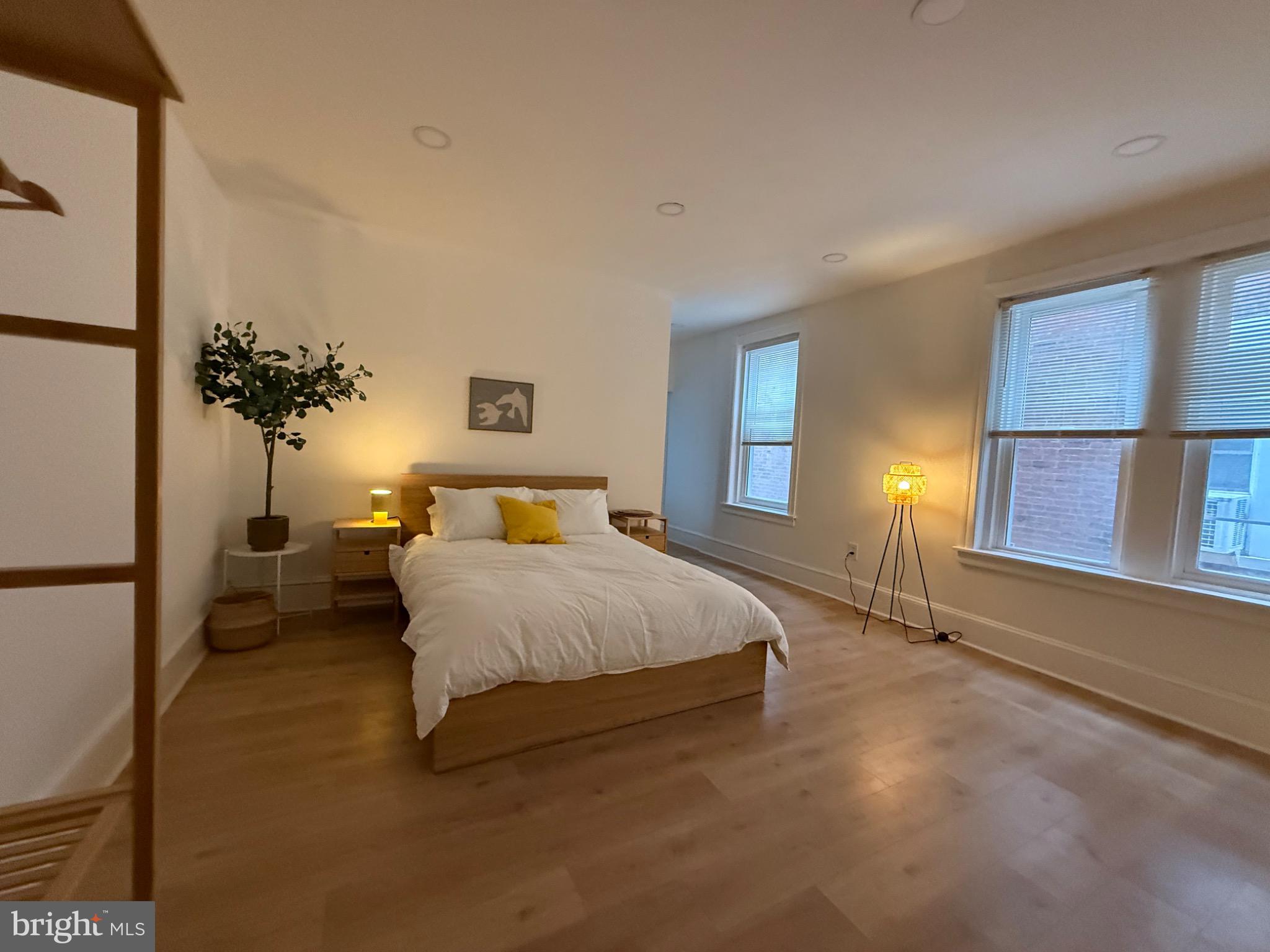 114 South 58th Street, Unit 1 Philadelphia, PA 19139 - Photo 7 of 15 a spacious bedroom with a bed and a window