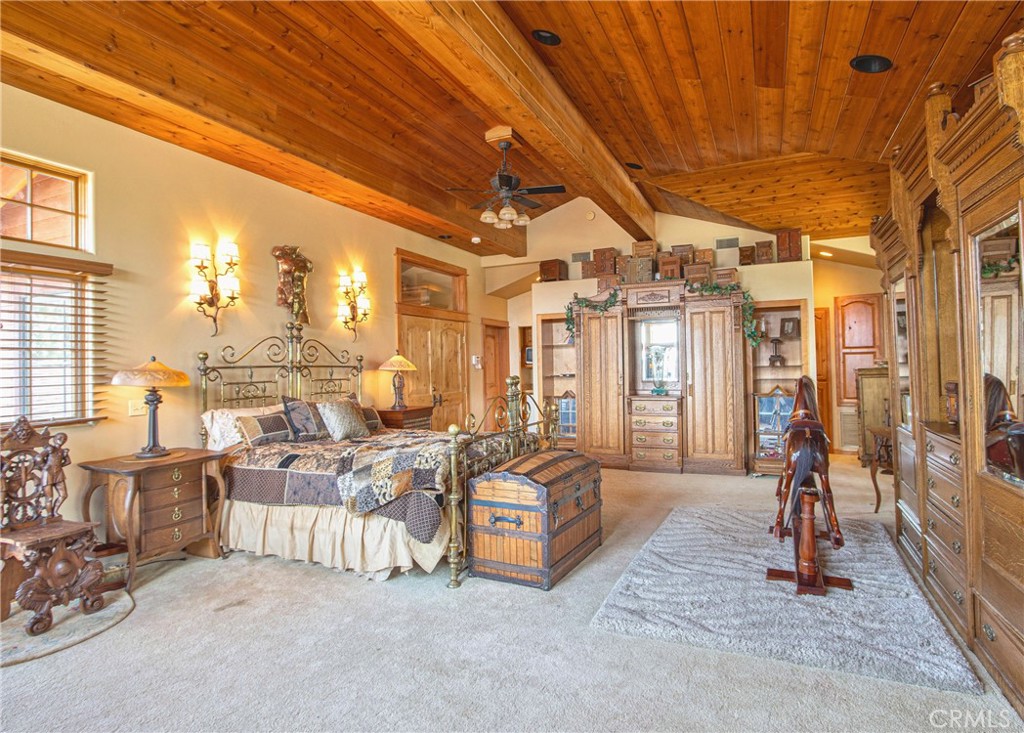 58111 Bonita Vista Road Mountain Center, CA 92561 - Photo 35 of 75 a living room with furniture and a chandelier