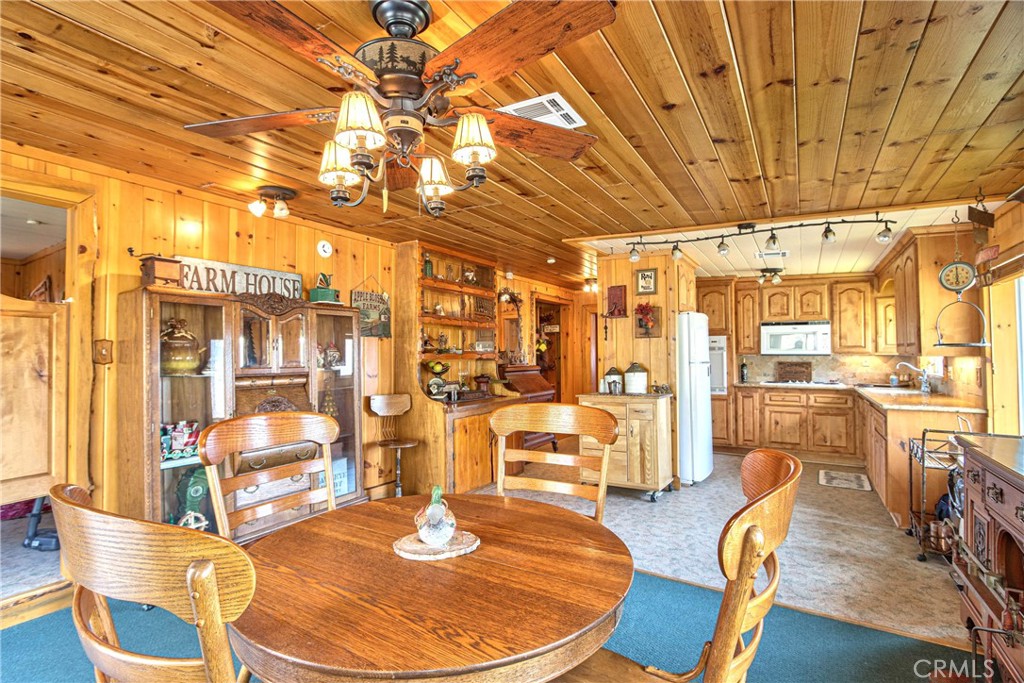 58111 Bonita Vista Road Mountain Center, CA 92561 - Photo 46 of 75 a dinning room with large glass table and chairs