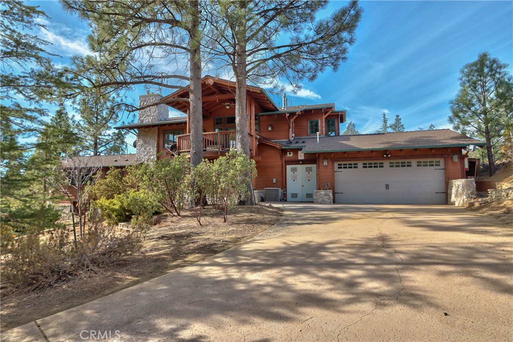 58111 Bonita Vista Road Mountain Center, CA 92561 - Photo 70 of 75 a front view of a house with a garden
