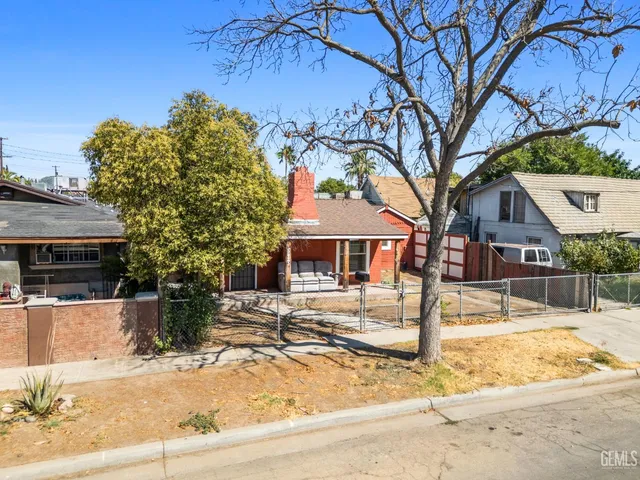 an aerial view of a house with a garden