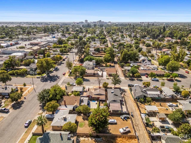 an aerial view of city and lake