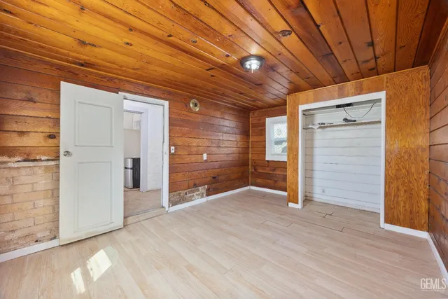 an empty room with closet