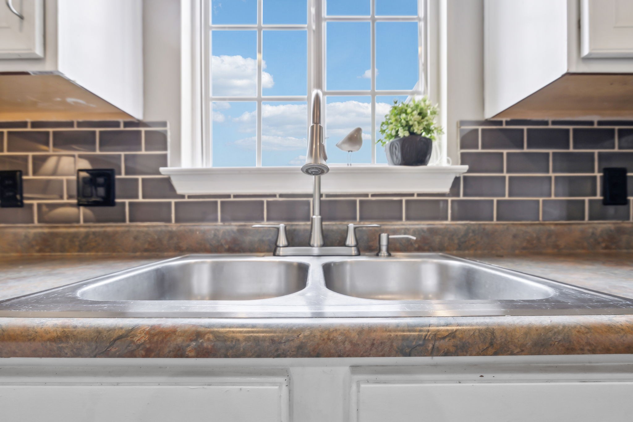 325 Golfview Lane Springfield, TN 37172 - Photo 23 of 51 a view of kitchen sink a counter and kitchen cabinets