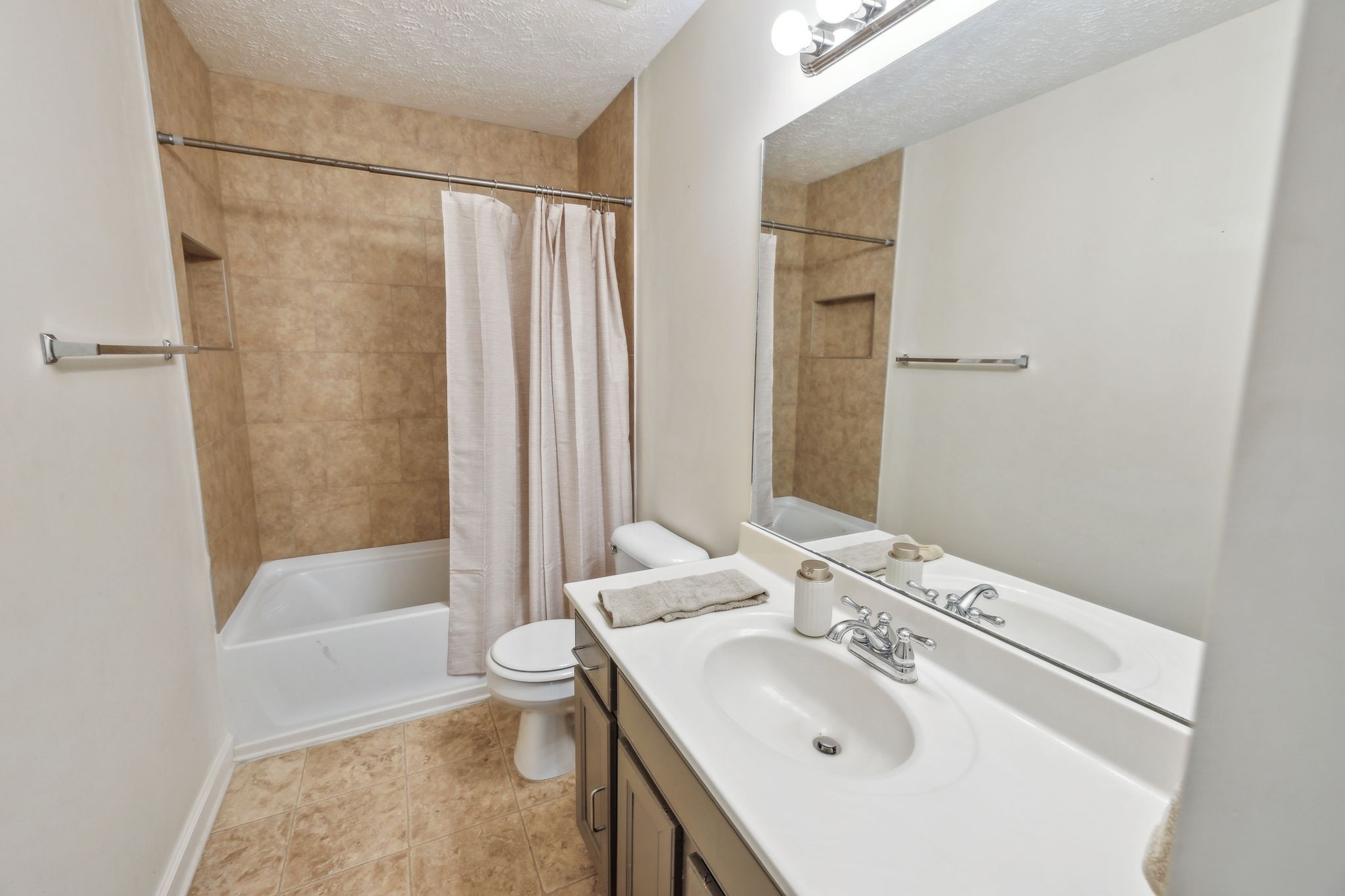 325 Golfview Lane Springfield, TN 37172 - Photo 30 of 51 a bathroom with a sink a toilet and shower