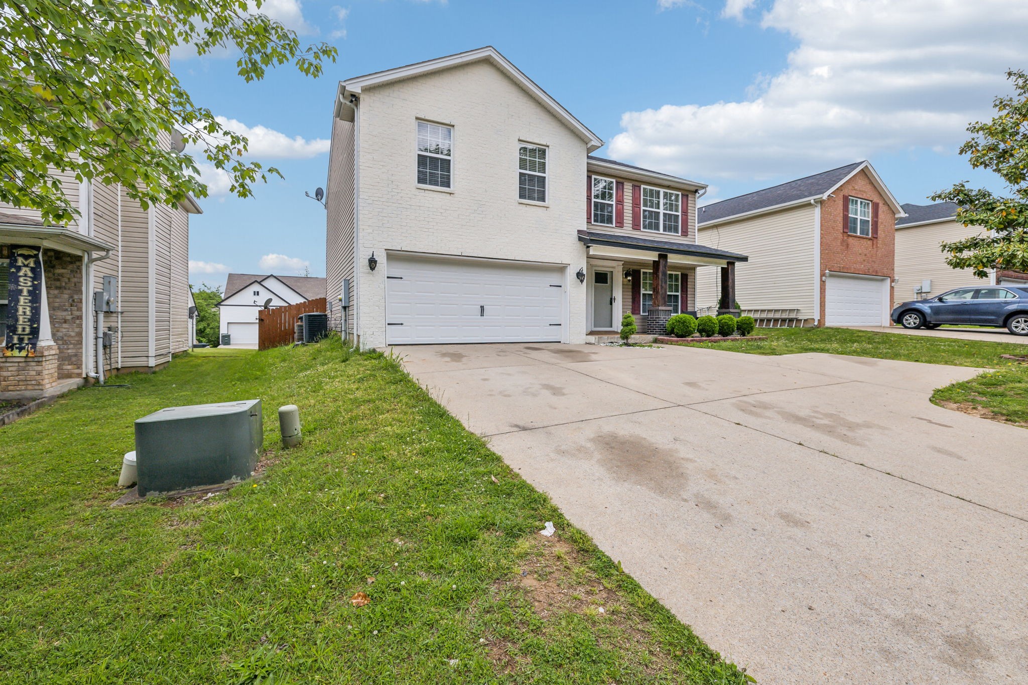 325 Golfview Lane Springfield, TN 37172 - Photo 4 of 51 a view of a house with backyard and a tree