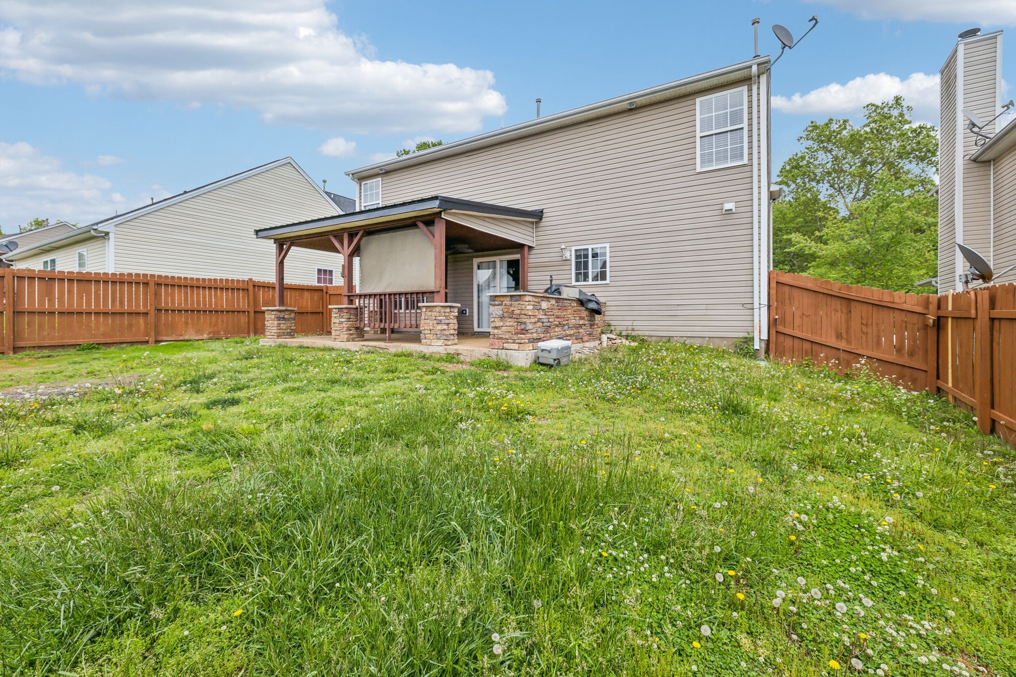 325 Golfview Lane Springfield, TN 37172 - Photo 46 of 51 a front view of house with yard and trees in the background