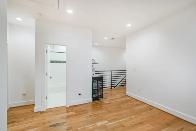 a room with chair and a window