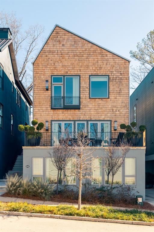 a view of house with yard
