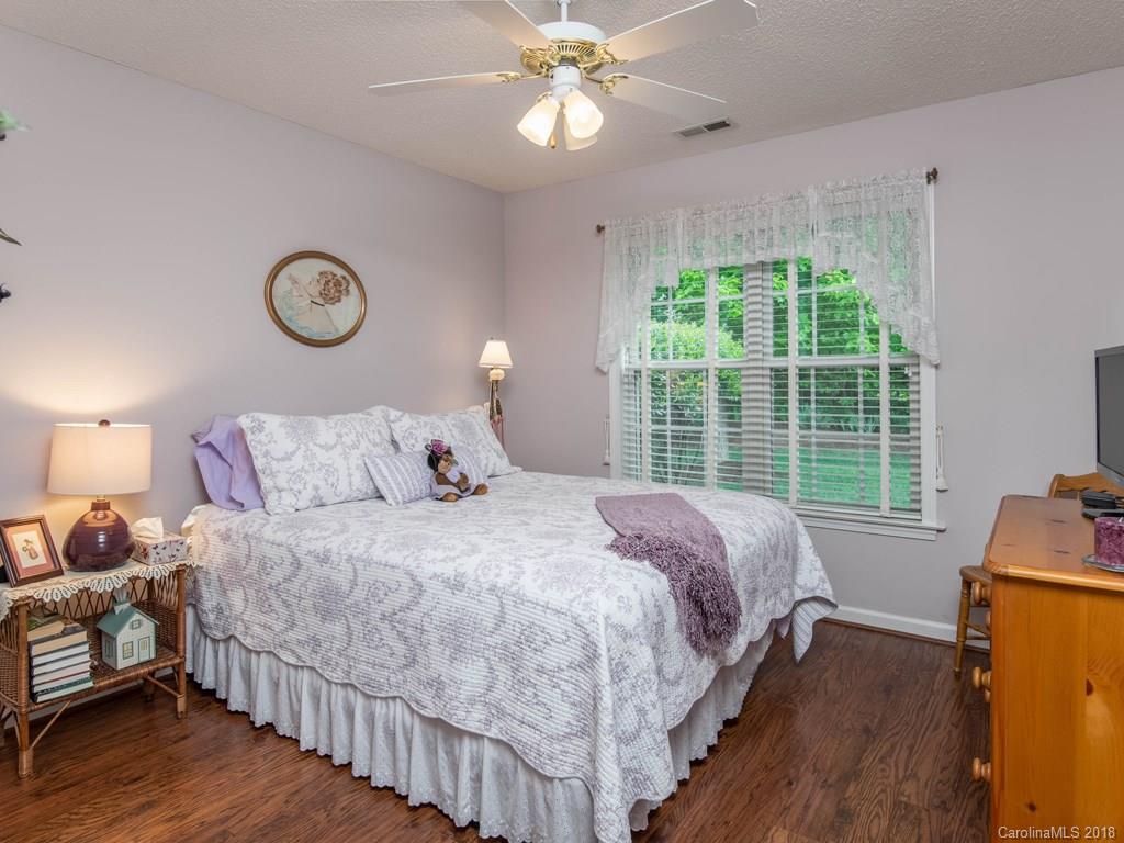 232 Stonehollow Road Fletcher, NC 28732 - Photo 23 of 35 a bedroom with bed and window