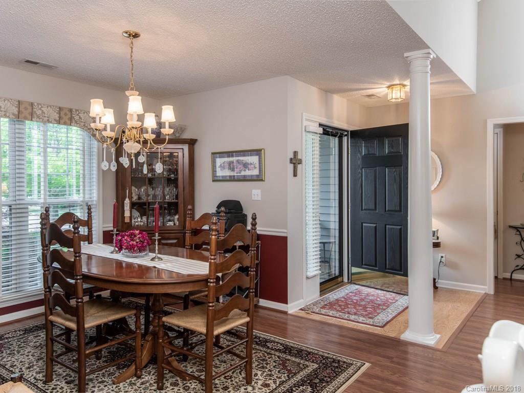 232 Stonehollow Road Fletcher, NC 28732 - Photo 6 of 35 a view of a dining room with furniture and chandelier
