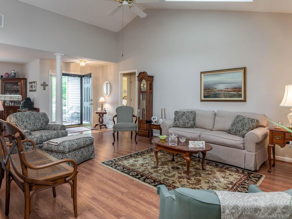 232 Stonehollow Road Fletcher, NC 28732 - Photo 8 of 35 a living room with furniture and wooden floor
