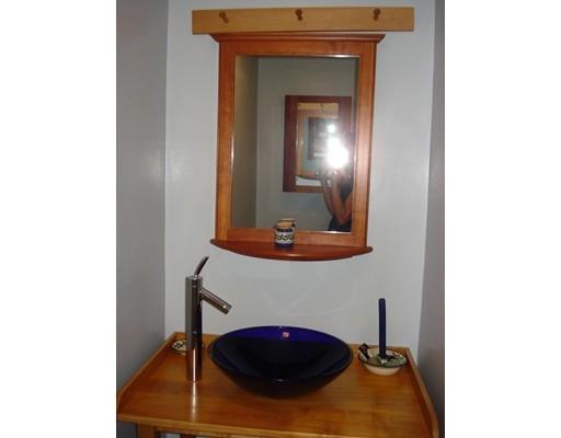 13 Scott Road Harvard, MA 01451 - Photo 17 of 29 a bathroom with a sink and a mirror