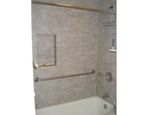 13 Scott Road Harvard, MA 01451 - Photo 25 of 29 a bathroom with a bathtub