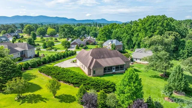 an aerial view of a house with a garden