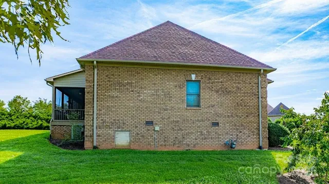 an aerial view of a house having swimming pool garden and patio